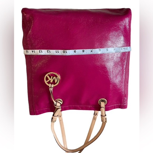 Beautiful eye catching fuscia pink patent leather tote. By Michael Kors. - Picture 6 of 14